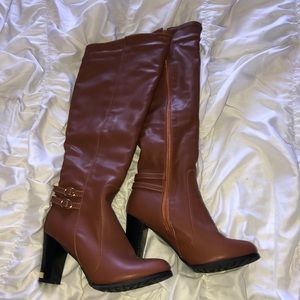 Brown heeled over the knee boots with buckle